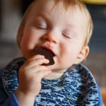 baby eating chocolate