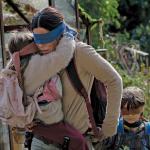 Birdbox blindfold leading kids on trail
