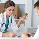 Female Doctor Writing Prescription