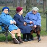 three old ladies on a bench