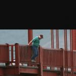 Man about to jump off bridge