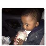 Black kid drinking smoothie