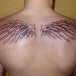 Wing back tattoo