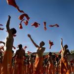 Convicts in Orange Jumpsuits Celebrating