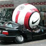 Soccer ball crushes car