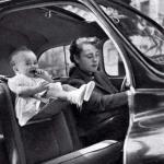 Baby Riding in Front Seat (circa: 1953) meme