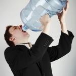 Man Drinking A Gallon Of Water