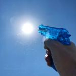 Water pistol on sun