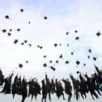 graduates jump for joy