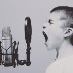 Kid scream into microphone