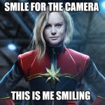 Captain marvel | SMILE FOR THE CAMERA; THIS IS ME SMILING | image tagged in captain marvel | made w/ Imgflip meme maker