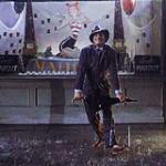 Gene_Kelly_Singing-In-The-Rain_giphy