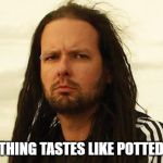 korn | SOMETHING TASTES LIKE POTTED MEAT | image tagged in korn | made w/ Imgflip meme maker