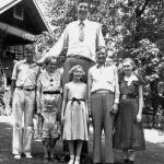 Giant guy with family