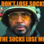 Tropic Laundry | I DON'T LOSE SOCKS; THE SOCKS LOSE ME | image tagged in tropic thunder survive hires,laundry,lol so funny,housework,movie quotes,mashup | made w/ Imgflip meme maker