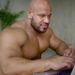 Buff guy on laptop 2