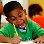 Angry kid writing