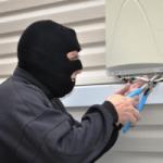 Burglar cutting phone line