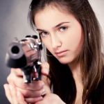 Girl with gun | .50 Desert Eagle. For the times you want to shoot an intruder. Hiding behind the refrigerator. In your neighbor's house. On the next block. | image tagged in girl with gun | made w/ Imgflip meme maker