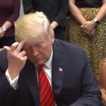 Trump scratches forehead