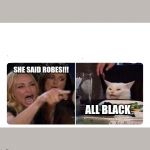 White cat at dinner table | SHE SAID ROBES!!! ALL BLACK | image tagged in white cat at dinner table | made w/ Imgflip meme maker