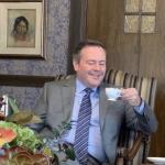 Jason Kenney sipping tea