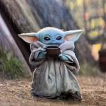 Baby Yoda drinking tea