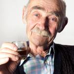 old man toasting