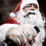Metal Santa | WHAT KIND OF MOTORCYCLE DO I RIDE? A HOLLY DAVIDSON! | image tagged in metal santa | made w/ Imgflip meme maker