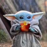 Baby Yoda sipping tea