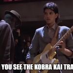 Ralph Macchio playing guitar | WHEN YOU SEE THE KOBRA KAI TRAINING | image tagged in ralph macchio playing guitar | made w/ Imgflip meme maker