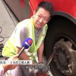 Bus Technician changing tires