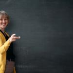 Teacher with Chalkboard