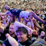 Crowdsurfing at a Rock Concert