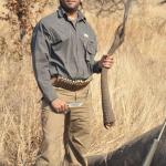 Donnie Trump clutches Dead Elephant Tail