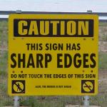 Caution this sign has Sharp Edges