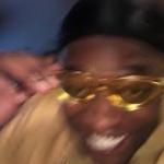 Black guy golden glasses meme