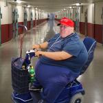 Trump in prison riding a scooter