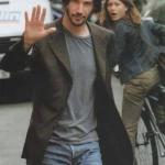 Woman starring at Keanu Reeves