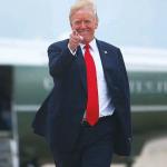 Trump pointing and smiling