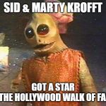 Enik Says | SID & MARTY KROFFT; GOT A STAR
ON THE HOLLYWOOD WALK OF FAME! | image tagged in enik says,enik,sleestak,land of the lost,sid and marty krofft,krofft superstars | made w/ Imgflip meme maker