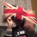 Person wearing an American Flag getting hit by British Flag meme