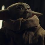 Baby yoda looks up