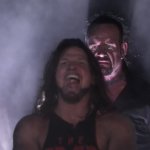 Undertaker teleports behind AJ Styles