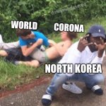 Two guys fighting | WORLD          CORONA; NORTH KOREA | image tagged in two guys fighting | made w/ Imgflip meme maker