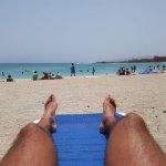 hairy legs sunbathing beach