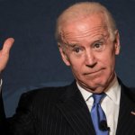 Biden raising his hand in agreement