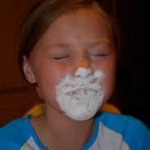 Girl eating flour