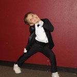 Excited boy in tux