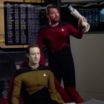 Riker holding Data's Arm